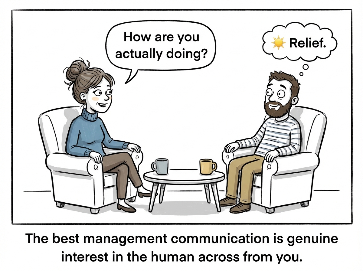 A manager and employee sitting across from each other in a relaxed one-on-one. The manager says 'How are you actually doing?' and means it. The employee looks surprised but relieved.