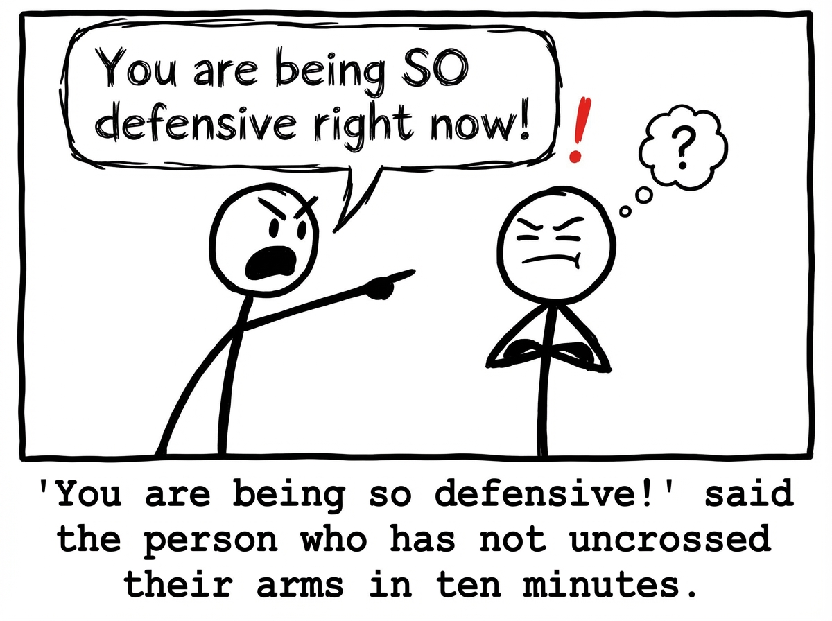 Two stick figures in an argument, one pointing aggressively at the other while shouting 'You are being SO defensive right now!'