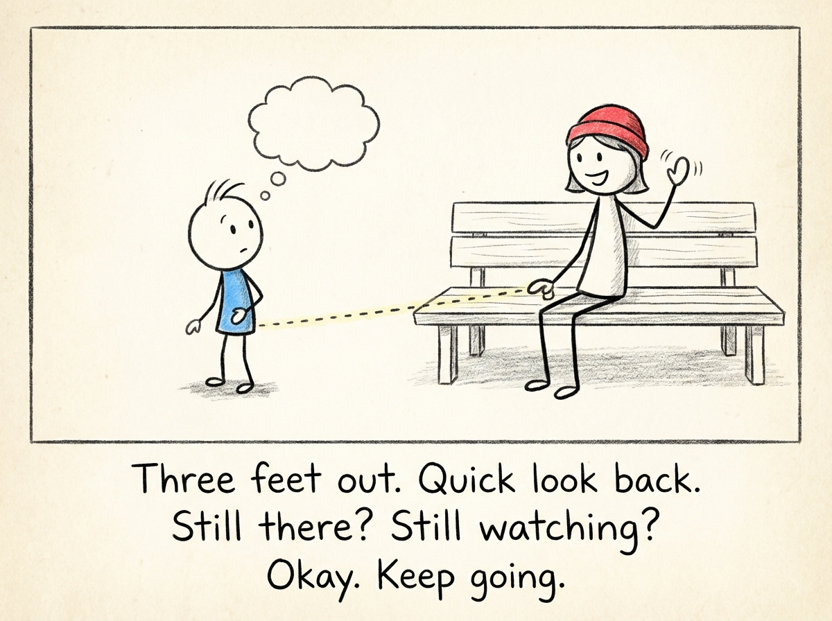 The child three feet away from the bench, looking back at the caregiver who waves and smiles, with a dotted line showing the invisible tether between them