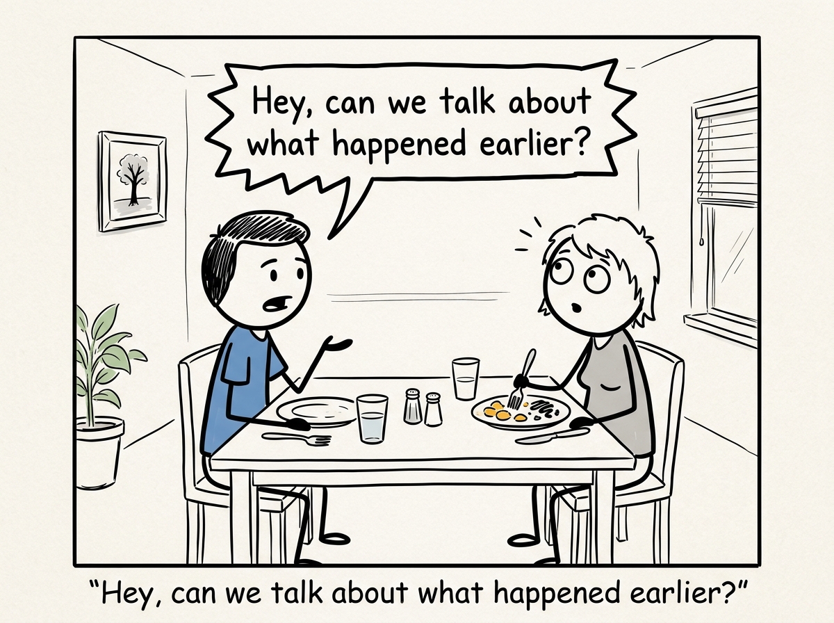 A couple sitting at a dinner table, one person starting to bring up a topic with a speech bubble, the other looking up from their plate