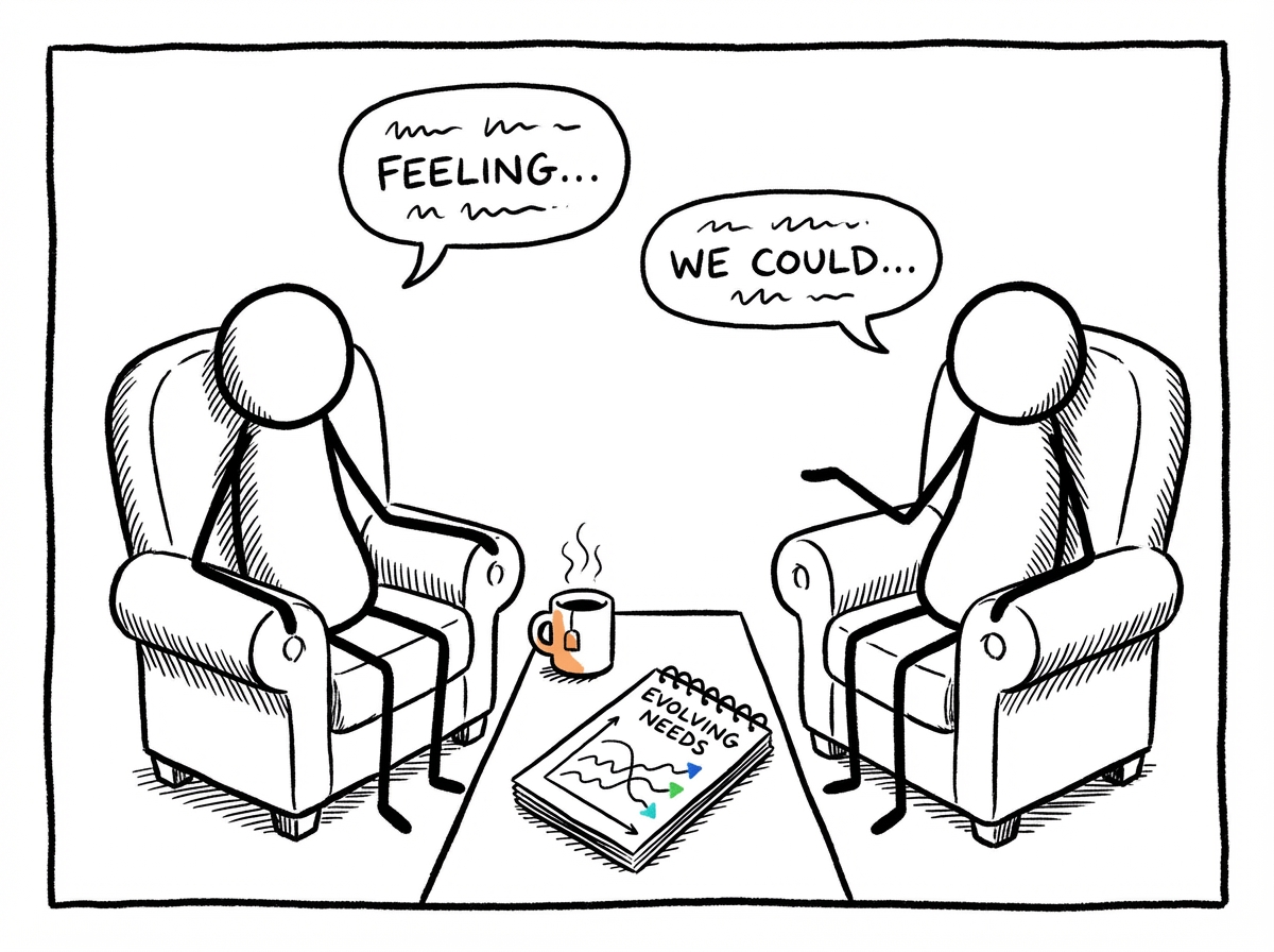 A couple sitting together with a warm drink, having a relaxed check-in conversation, with a small chart between them showing their evolving needs